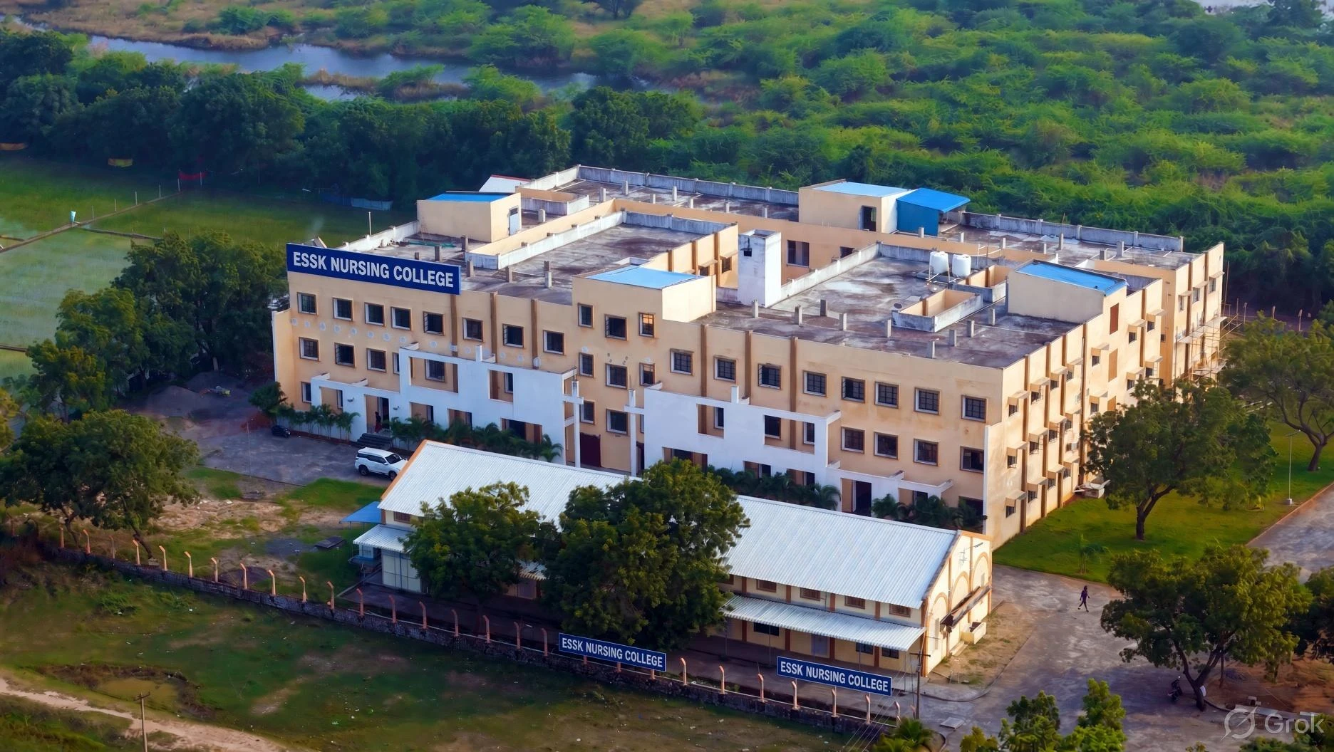 Aerial view of the campus: a large building and a smaller hall with ESSK Nursing College signs, surrounded by trees and fields
